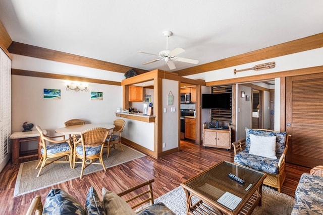 living room with ceiling fan, dark wood finished floors, and baseboards