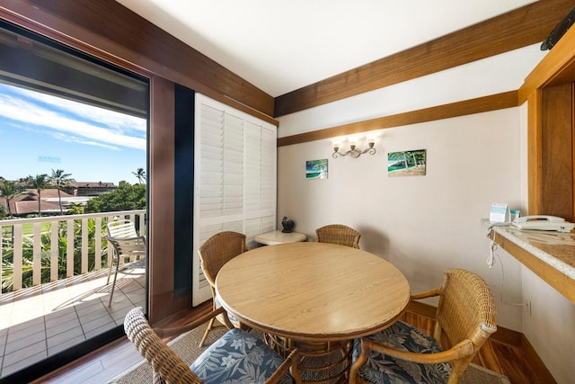 dining space featuring wood finished floors