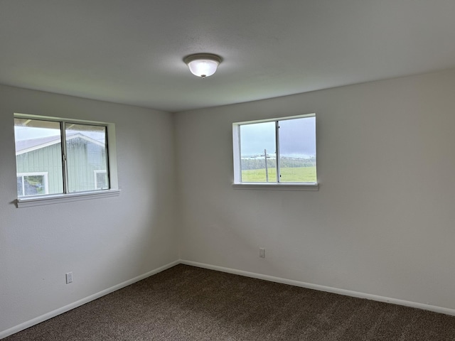 empty room with carpet flooring