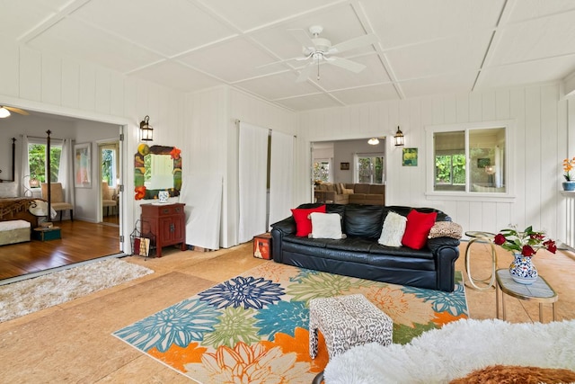 living room featuring a ceiling fan