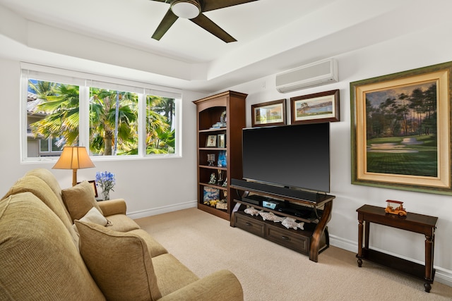 carpeted living room featuring ceiling fan, a wall mounted AC, and a raised ceiling