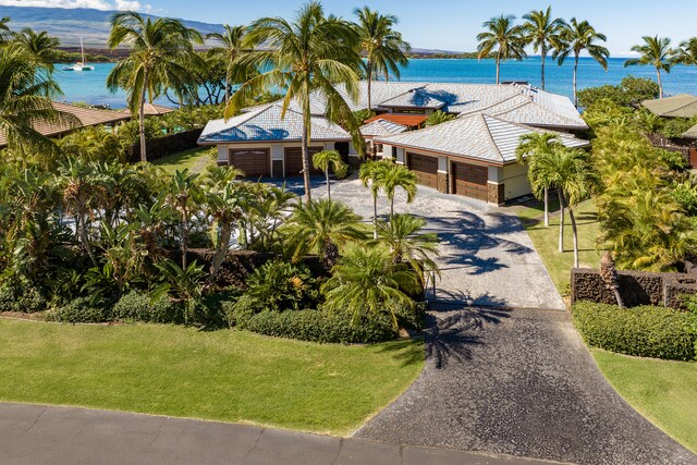 bird's eye view with a water view