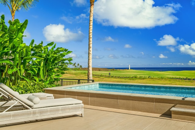 view of pool featuring a water view