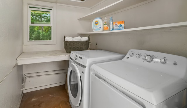 laundry room featuring washer and clothes dryer