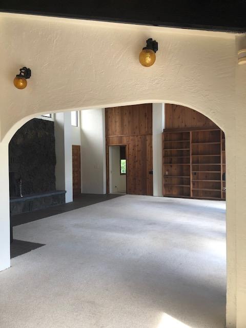 garage featuring wooden walls