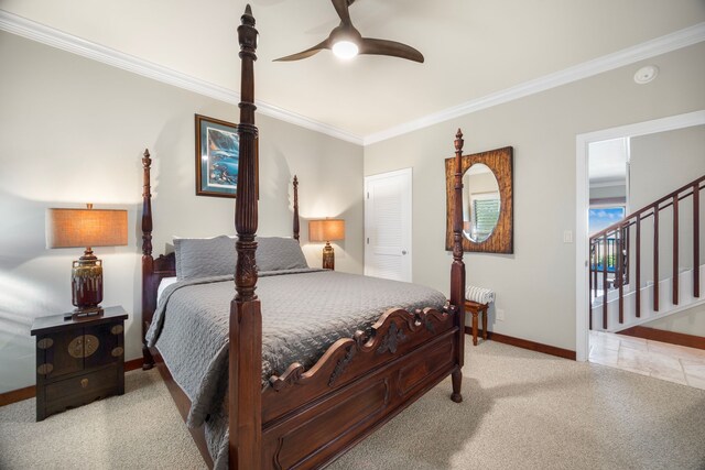 bedroom featuring access to exterior, ceiling fan, ornamental molding, and a closet