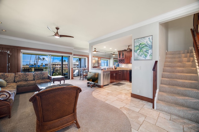 living room with crown molding and ceiling fan