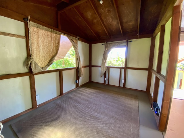 unfurnished room with a sunroom