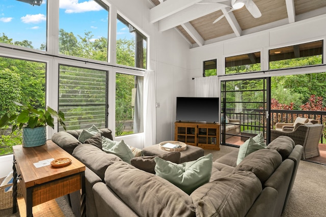 living room with wooden ceiling, beamed ceiling, ceiling fan, carpet floors, and high vaulted ceiling