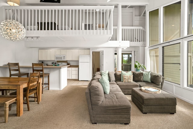 living room with light colored carpet