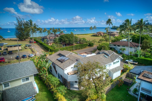 birds eye view of property featuring a water view