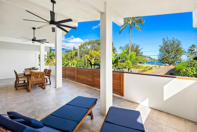 view of patio featuring outdoor dining space and ceiling fan