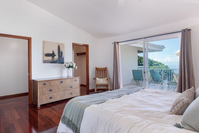 bedroom featuring access to outside, lofted ceiling, and dark hardwood / wood-style floors