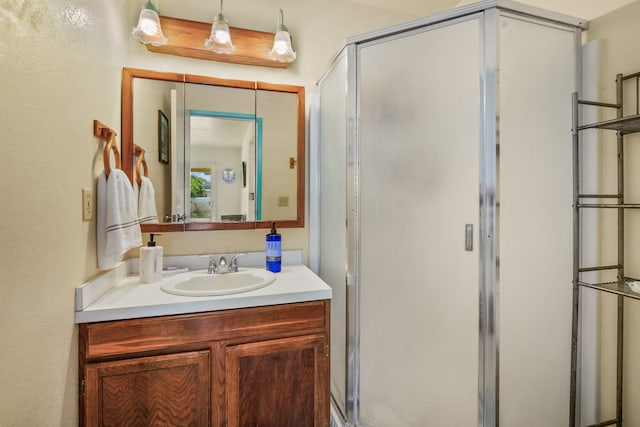 bathroom featuring vanity and walk in shower