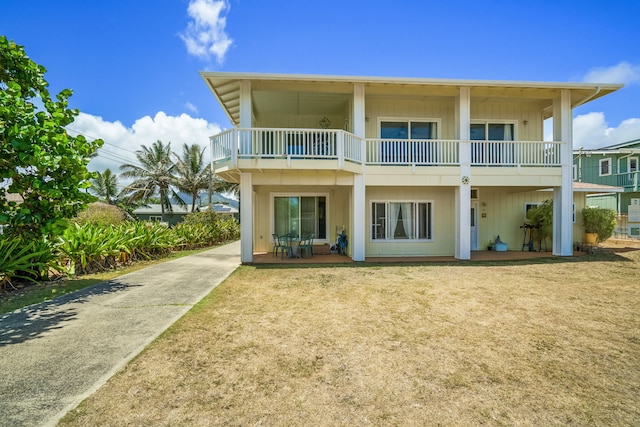 rear view of house with a balcony