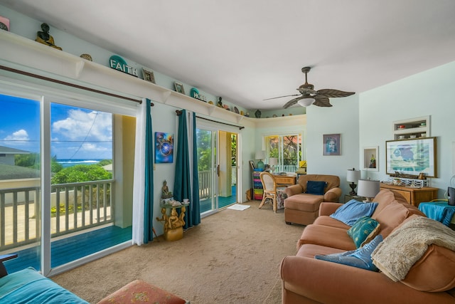 living room featuring carpet flooring and ceiling fan