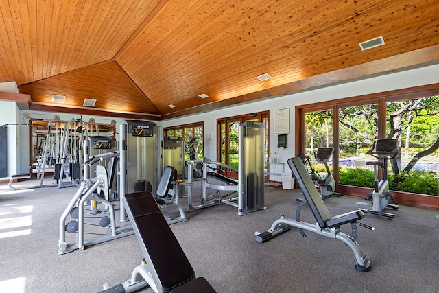 workout area with vaulted ceiling and wooden ceiling