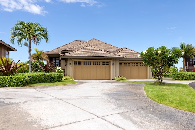 view of front of property with a garage