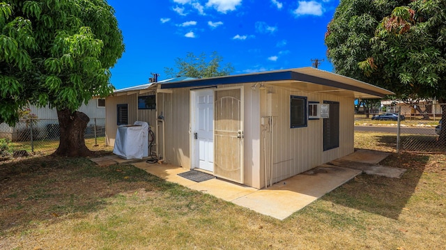 view of outdoor structure featuring a yard