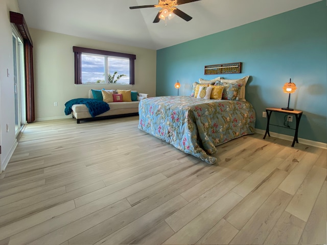 bedroom featuring light wood-type flooring and ceiling fan