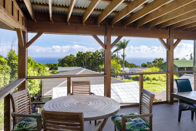 wooden deck featuring a water view