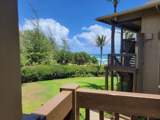 view of yard featuring a deck with water view