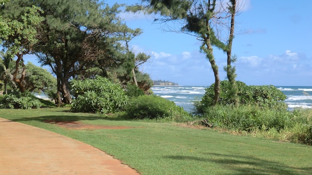 view of yard with a water view