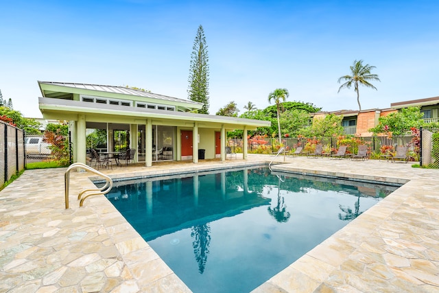 view of pool with a patio