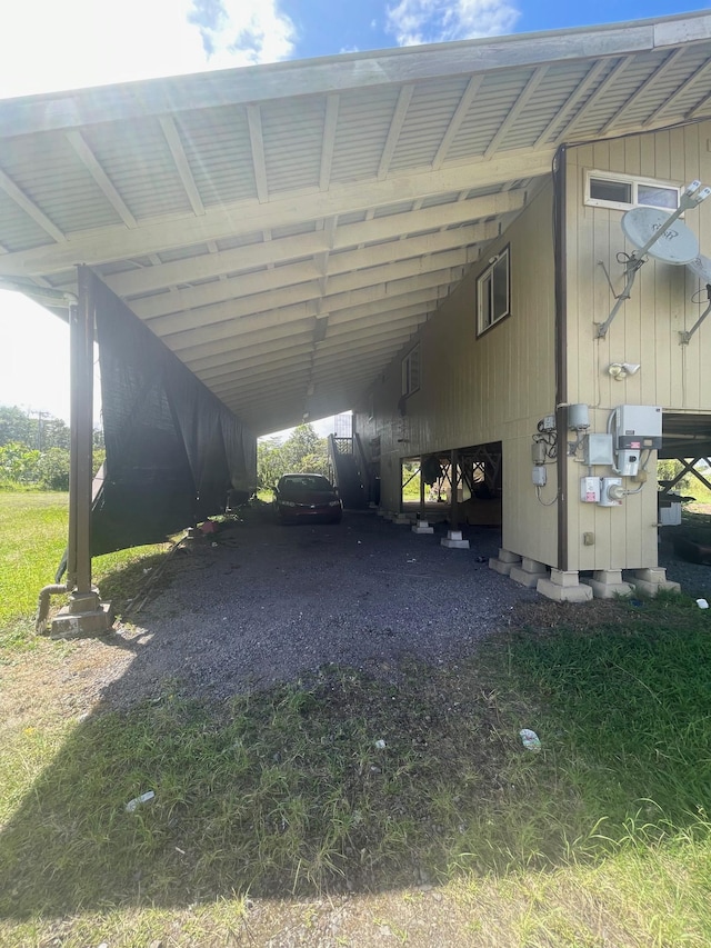 view of car parking with a carport