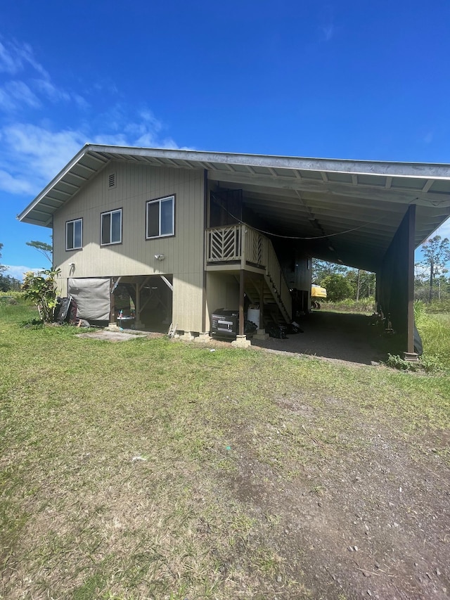 view of car parking featuring a carport and driveway