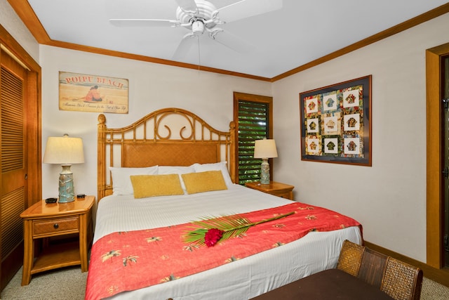 carpeted bedroom with ceiling fan, a closet, and ornamental molding