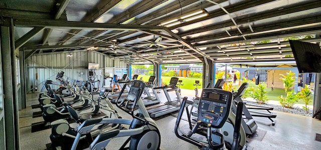 gym with vaulted ceiling