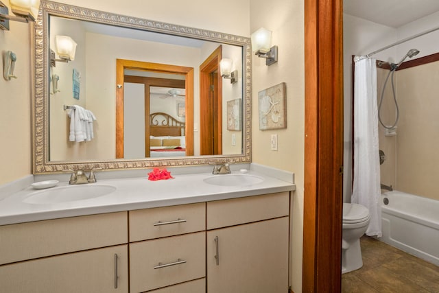 full bathroom with shower / bathtub combination with curtain, toilet, vanity, and tile patterned floors