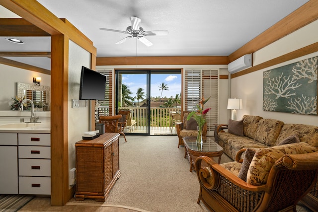 carpeted living room featuring sink, a wall mounted AC, and ceiling fan