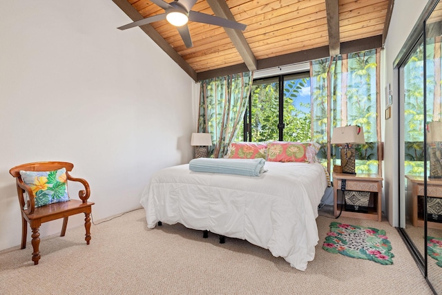 carpeted bedroom with vaulted ceiling with beams, wooden ceiling, a sunroom, and a ceiling fan