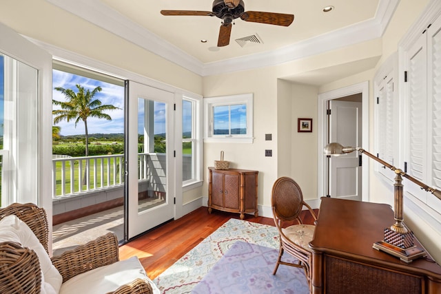 office area with french doors, light hardwood / wood-style floors, ceiling fan, and ornamental molding