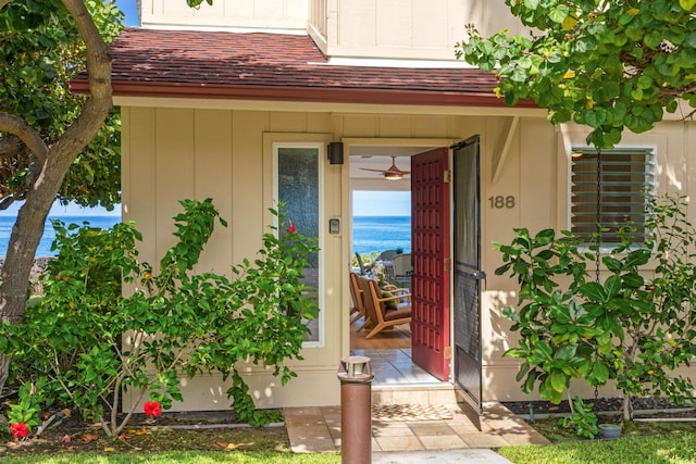 doorway to property featuring a water view