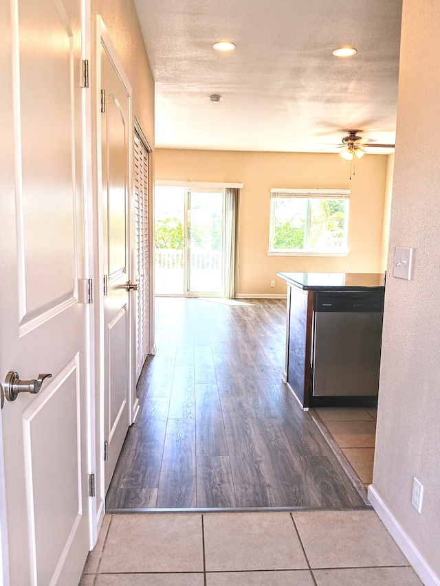 hall with dark wood-type flooring