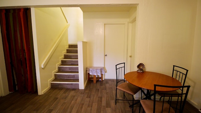 dining room featuring dark wood-type flooring