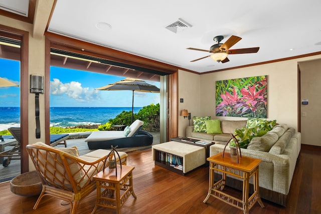 interior space featuring ceiling fan, a water view, dark hardwood / wood-style flooring, and crown molding