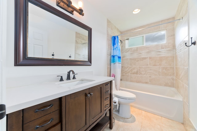 full bathroom featuring tile patterned floors, shower / bath combination with curtain, toilet, and vanity