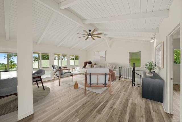 interior space with beamed ceiling, wood ceiling, high vaulted ceiling, ceiling fan, and light wood-type flooring