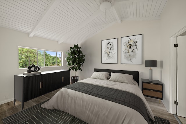 bedroom with vaulted ceiling with beams, wooden ceiling, and hardwood / wood-style flooring