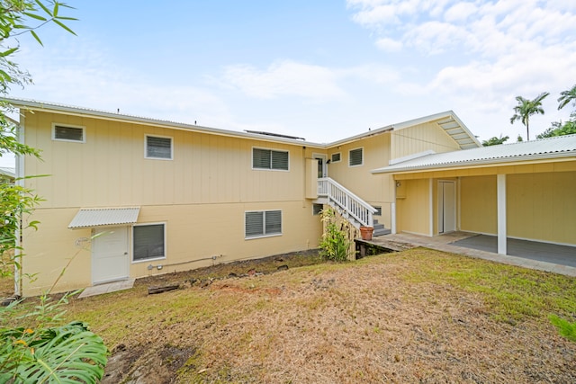 rear view of property with a patio