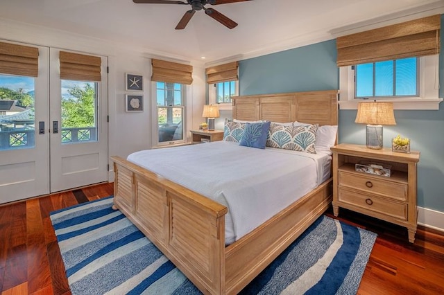 bedroom with access to exterior, french doors, dark hardwood / wood-style floors, and ceiling fan