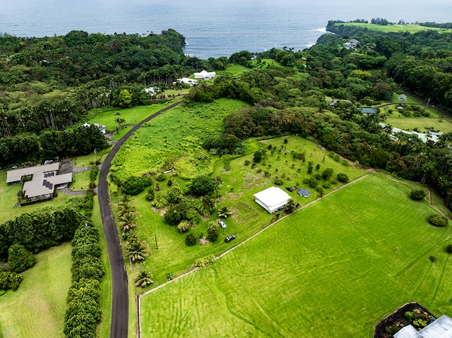 drone / aerial view featuring a rural view and a water view