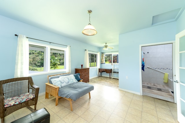 living area with ceiling fan