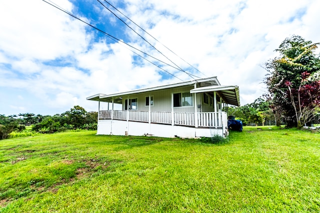 exterior space featuring a front yard and a porch