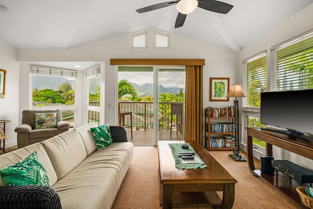 living room with light carpet, vaulted ceiling, and ceiling fan