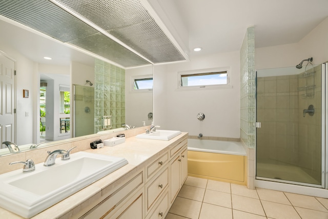 bathroom featuring vanity, separate shower and tub, and tile patterned floors